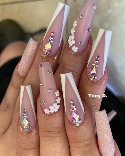Fancy nails redding photos - Select a polish with pearl shimmer and apply one coat. Once dried, apply the polish in dots across the nail and swirl in circular motions with a dotting tool. Nail artist @ simlynail, who created ...